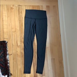Black patterned lululemon leggings with stitching